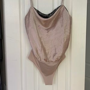 NWT (Never worn) - LUSH - Medium thong bodysuit with button closure.